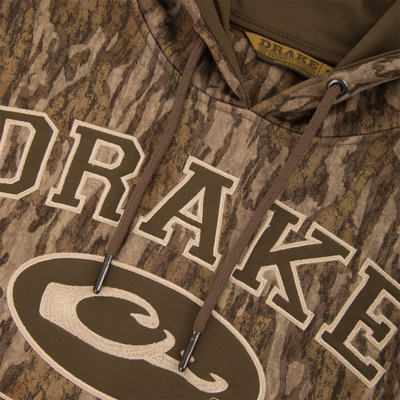 Performance Hoodie featuring an anti-pilling outer shell, lined hood with drawstring, kangaroo pocket, and built-in stretch, ideal for versatile comfort and durability.