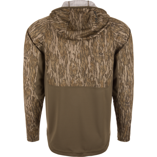 The Waterfowl EST Performance Half-Zip Hoodie features a camo pattern on the upper half and sleeves, with solid olive green on the lower half and hood, plus a hooded, water-resistant design.