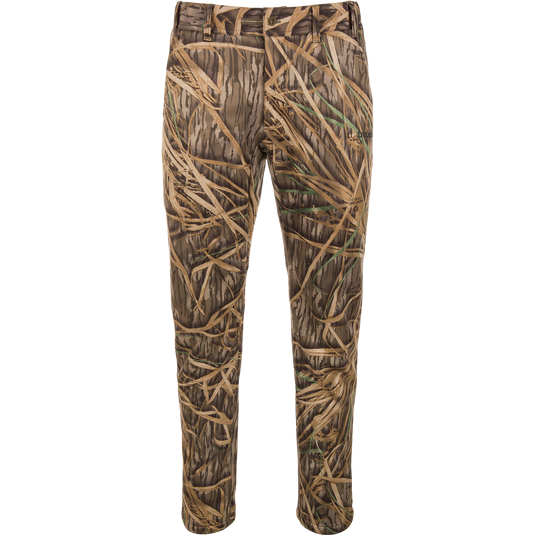 The Waterfowl BMF Ultimate Wader Pants feature a grass and reed camouflage pattern with a durable polyester fleece shell—ideal for hunting or outdoor use. Displayed on a plain white background.
