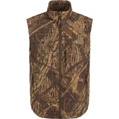 MST Synthetic Down Pack Vest with camouflage design, featuring a zipper, traditional baffle pattern, and synthetic down insulation, ideal for versatile hunting attire.