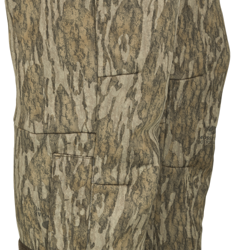 MST Ultimate Wader Pants displaying adjustable ankle zippers and side-elastic waist, ideal for comfort under waders or casual use, embodying Drake Waterfowl's commitment to versatile hunting apparel.
