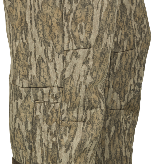 MST Ultimate Wader Pants displaying adjustable ankle zippers and side-elastic waist, ideal for comfort under waders or casual use, embodying Drake Waterfowl's commitment to versatile hunting apparel.
