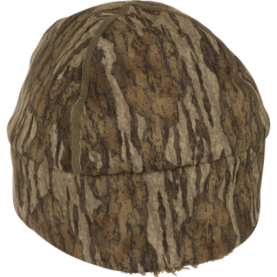 LST Windstopper Beanie: A close-up of a camouflaged hat made of high-quality hunting gear, perfect for big game hunting, waterfowl hunting, turkey hunting, and fishing.