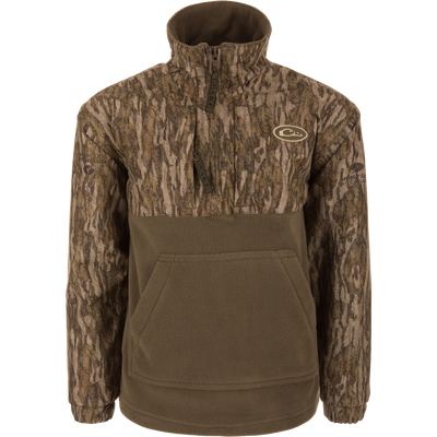 MST Youth Eqwader Quarter Zip Jacket with camo-patterned upper, olive fleece lower, features kangaroo pocket, branded zippers, designed for dual-zone comfort with waterproof and breathable materials.