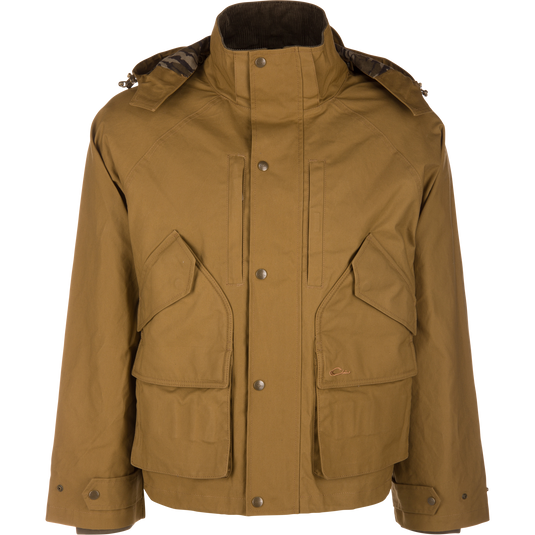 Tan MST Drake Dry Waxed Cotton Wading Jacket with a stand-up collar, detachable hood, and four large front pockets, designed for durability in outdoor conditions.