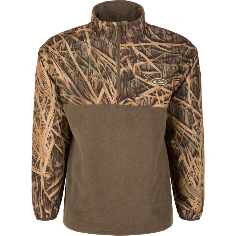 MST Quarter Zip Refuge Eqwader Jacket featuring a camouflage print on the upper body and olive-brown fleece below, designed for comfort and performance in waterfowl hunting.