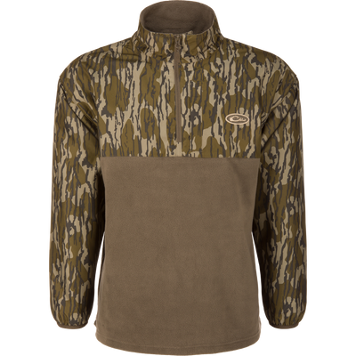Waterfowl MST Quarter Zip Refuge Eqwader Jacket featuring a camouflage pattern on the upper chest, sleeves, and collar, with a solid olive lower section, designed to integrate with the Eqwader Hybrid System.