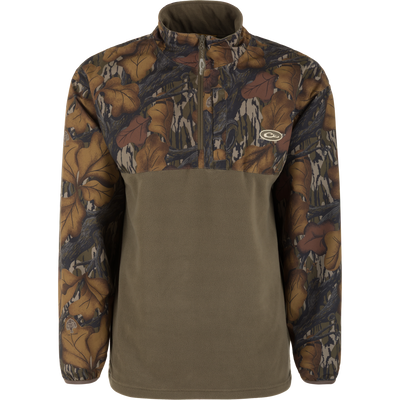 The Waterfowl MST Quarter Zip Refuge Eqwader Jacket features a brown and green camo upper with a solid olive-green lower half and quarter-zip front—perfect for pairing with your favorite breathable wader.