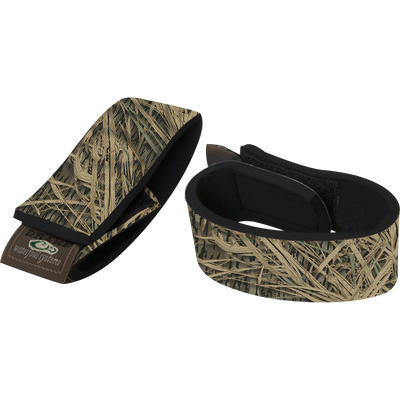 Waterfowl Ankle Garters: two stretch neoprene straps with grass camo, Velcro closures, and brown logo tags—ideal as wader accessories or ankle garters.