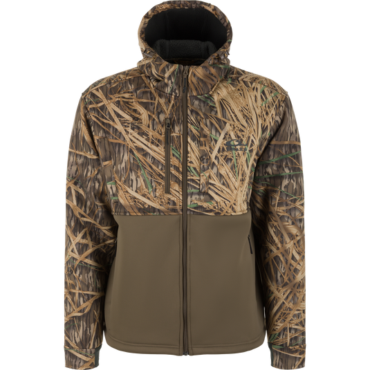 The Waterfowl MST Hole Shot Hooded Windproof Eqwader Full Zip Jacket in Mossy Oak Original Shadow Grass Two-Tone features a camo top, solid olive lower half, side pockets, and windproof protection for style and function.