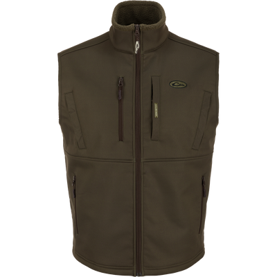 The MST Hole Shot Two-Tone Eqwader Vest by Waterfowl in Green Timber is sleeveless and windproof with a high collar, four zippered pockets, and a subtle chest logo. Thick material makes it perfect for outdoor wear. Laid flat on white.