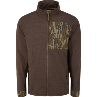 MST Heritage Hybrid Windproof Jacket with camo accents, featuring a zippered chest pocket and stand-up collar, designed for durability and outdoor functionality.