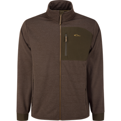MST Heritage Hybrid Windproof Jacket with mock-neck, brass zipper, olive chest overlay, zip pockets; designed for durability, water resistance, and warmth with fleece lining.