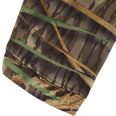 Close-up of a brown and green camouflage Slacker Wader Pocket Hoodie sleeve with a hemmed cuff.