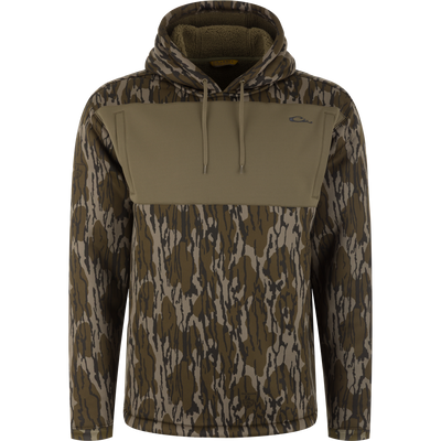 Slacker Wader Pocket Hoodie in a Mossy Oak Original Bottomland camouflage pattern with a solid olive green chest panel and a drawstring hood.
