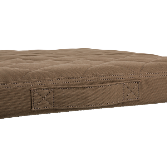 Quilted canvas dog bed with diamond-pattern stitching, featuring a reinforced handle for portability, ideal for outdoor-loving dogs. Water-resistant, memory foam core for comfort.