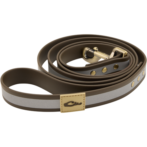Team Gun Dog TPU Coated Waterproof Leash with reflective strip, brass-tone snap hook, and plaque, designed for durability and reliability in active hunting environments.