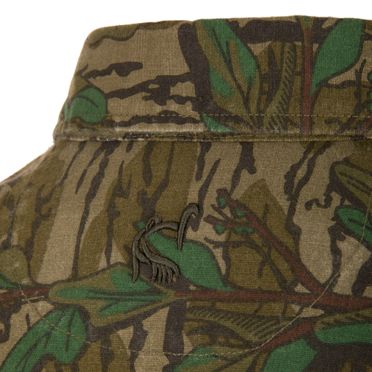 Throwback 80 Button Down Field Shirt in close-up, showcasing durable cotton twill fabric and reinforced stitching, ideal for outdoor adventures.