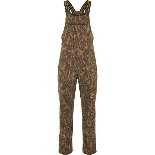Turkey Bib with Spider Web Technology features brown overalls with straps, offering stretch material, water-resistant seat, and cargo pockets for hunting and outdoor activities.