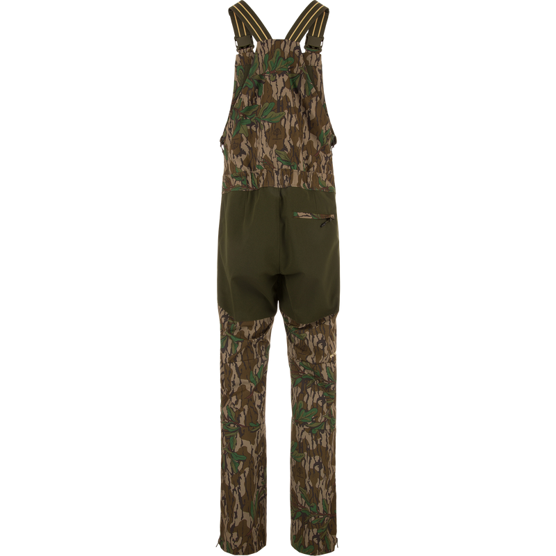 Turkey Bib with Spider Web Technology, featuring camouflage overalls and pants with cargo pockets, designed for high-performance hunting with breathability and water resistance.