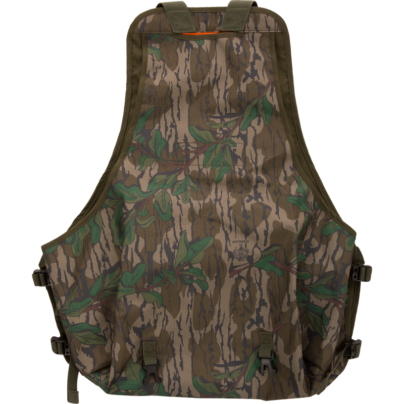 Youth Time and Motion Turkey Vest with camouflage pattern, straps, and quick-draw pouches, offering durability and comfort for hunting with neoprene shoulder straps and safety flag.