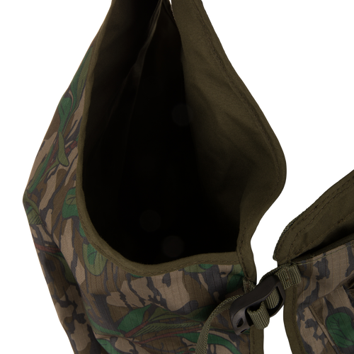 Youth Time and Motion Turkey Vest: Camouflage design with zipper, black buckle, and neoprene straps; includes quick-draw slate call pouch and removable padded seat cushion for hunting.