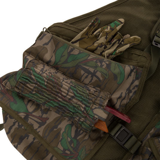 Youth Time and Motion Turkey Vest with camouflage pattern, featuring gloves, a bag, and quick-draw pouches, ideal for hunting.