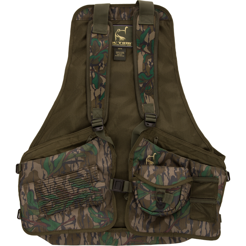 Youth Time and Motion Turkey Vest with camouflage pattern, featuring quick-draw pouches, padded seat cushion, and neoprene straps for enhanced comfort and functionality.