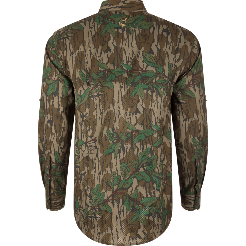 Men's Camo Wingshooter Trey Shirt with camouflage pattern, featuring vented back, flap chest pockets, and adjustable roll-up sleeves, designed for performance and comfort.