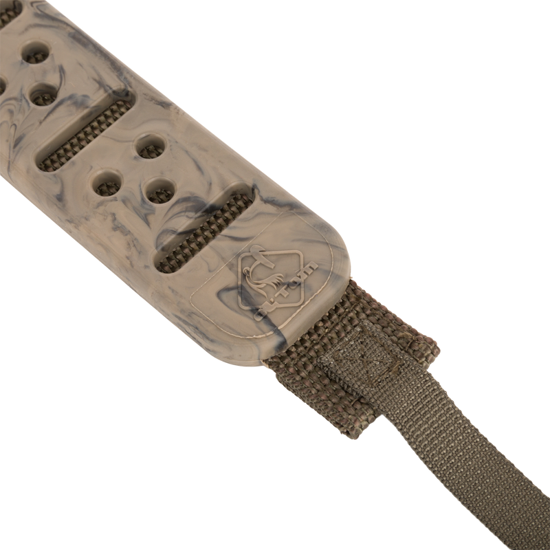 Turkey Tote's close-up featuring robust vulcanized rubber strap, durable polypropylene webbing, and solid metal slip ring for secure bird transport.