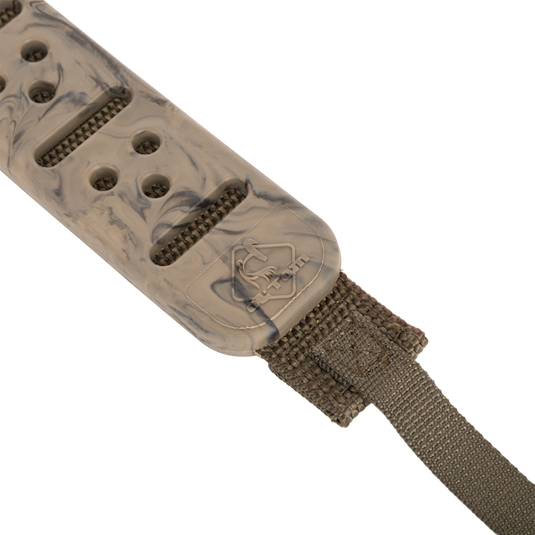 Turkey Tote's close-up featuring robust vulcanized rubber strap, durable polypropylene webbing, and solid metal slip ring for secure bird transport.