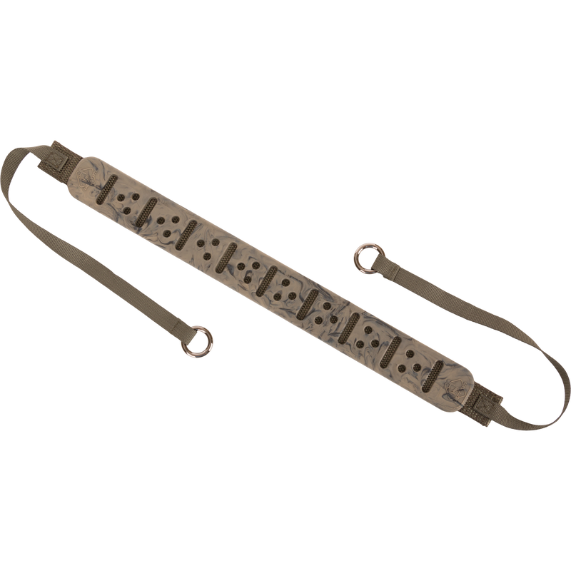 Close-up of the Turkey Tote's strap with holes, featuring a durable metal slip ring for easy attachment, designed for transporting birds securely.