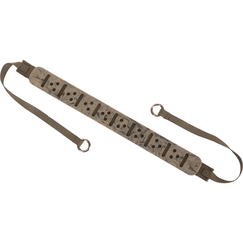 Close-up of the Turkey Tote's strap with holes, featuring a durable metal slip ring for easy attachment, designed for transporting birds securely.