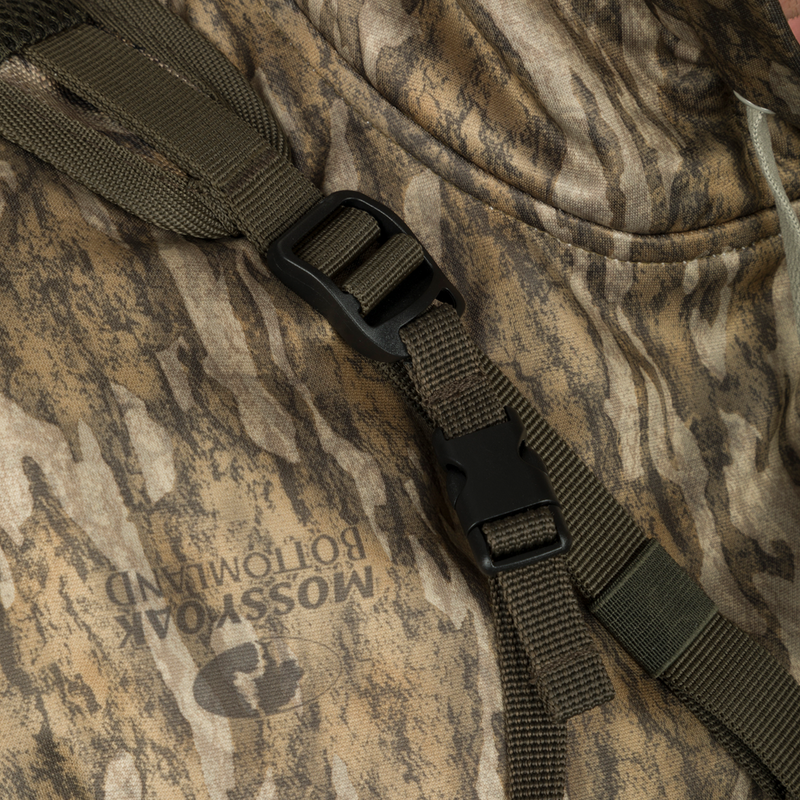 Turkey Chest Pack with camouflage strap and black buckle, designed for hunting trips with multiple compartments and lightweight 600D Polyester construction.