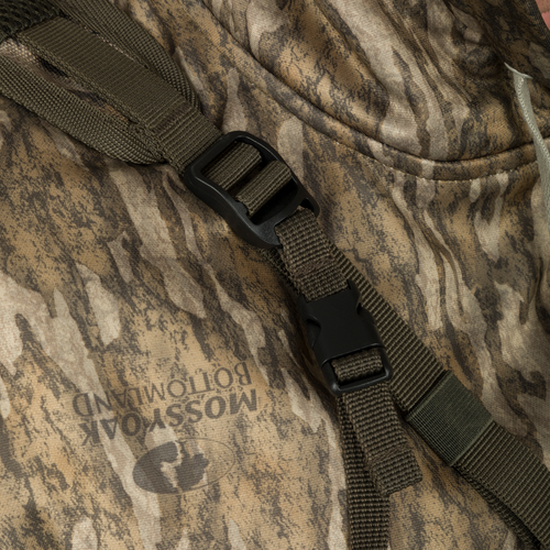 Turkey Chest Pack with camouflage strap and black buckle, designed for hunting trips with multiple compartments and lightweight 600D Polyester construction.