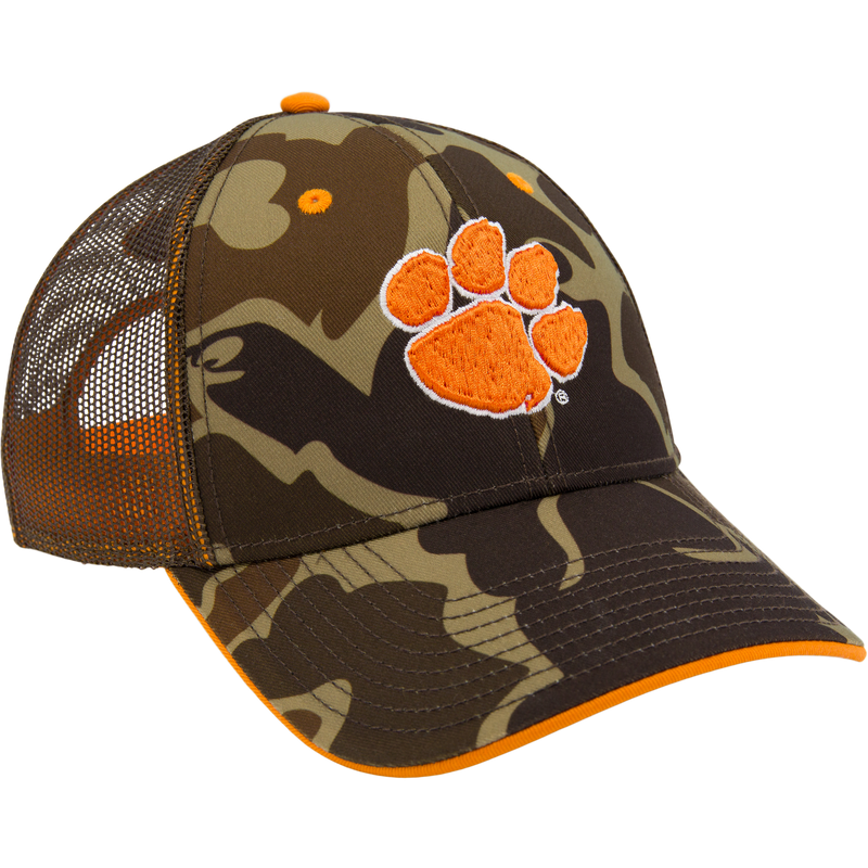 Clemson Old School Cap, trucker-style with mesh back, features a woodland camo print and orange paw-print logo, adjustable snap-back, low-profile design.