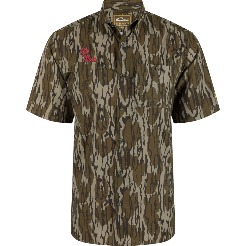 Ole Miss 8-Shot Short Sleeve Shirt in tree bark camo with camp collar, two chest pockets, embroidered logo, ideal for hunting with technical performance features.