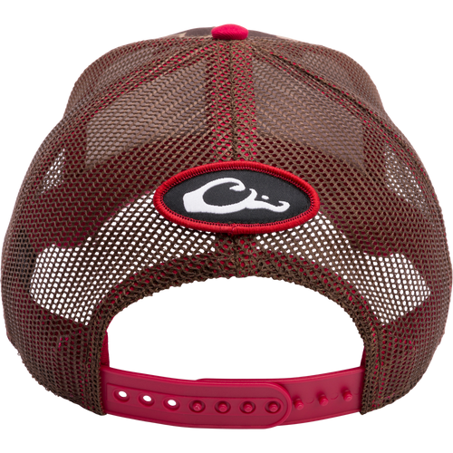 A South Carolina Old School Cap from Drake Waterfowl: Brown hat with red logo, mesh back panels, 6-panel construction, curved visor, and adjustable snap-back closure. Ideal for hunting and casual wear.