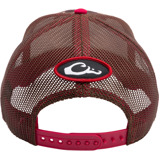 A South Carolina Old School Cap from Drake Waterfowl: Brown hat with red logo, mesh back panels, 6-panel construction, curved visor, and adjustable snap-back closure. Ideal for hunting and casual wear.