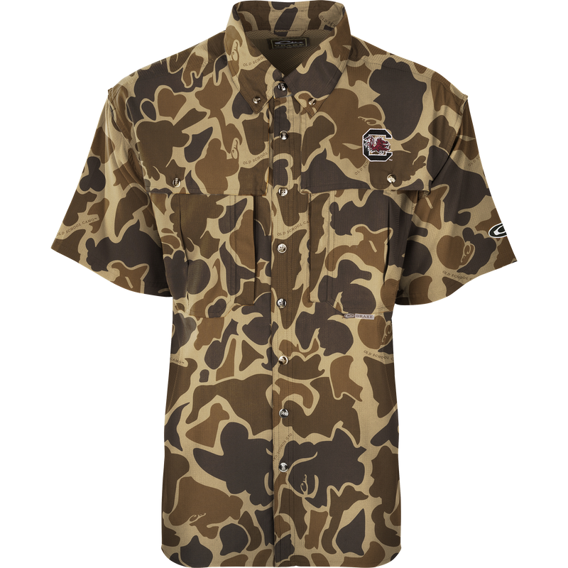 South Carolina S/S Flyweight Wingshooter: A camouflage shirt with a gamecock logo, perfect for warm-weather outdoor activities. Made of ultra-lightweight polyester, it dries quickly and wicks moisture away. Features include UPF 50+ sun protection, vented back, chest pockets, and a vertical zipper pocket.