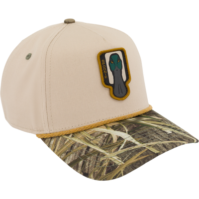 Spoonie Logo Cap in Mossy Oak Shadow Grass Habitat featuring a grass-patterned brim, a braided cord along the base of the crown, and a patch with a mallard duck head, perfect for everyday wear.