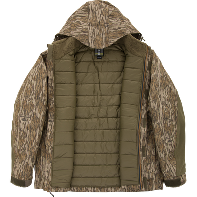 Spoonie Shoveler Insulated Jacket in camo-print with an attached hood and olive green quilted interior lining.