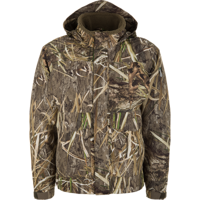 Spoonie Shoveler Insulated Jacket in Mossy Oak Shadow Grass Habitat featuring a brown, green, and tan grass-and-bark camouflage pattern.