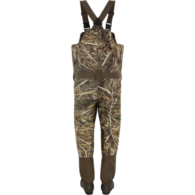 Spoonie Youth Mud-Sucker Neoprene Waders in camouflage with shoulder straps and insulated hunting boots.