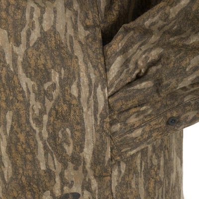 Close-up of a brown tree-bark camouflage Spoonie Campfire Hoodie featuring long sleeves and a side pocket.