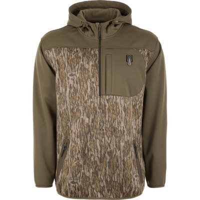 Spoonie Hollywood Jacket in Mossy Oak Bottomland: an olive green softshell quarter-zip hoodie featuring camouflage pattern panels on the torso and a single zippered chest pocket.