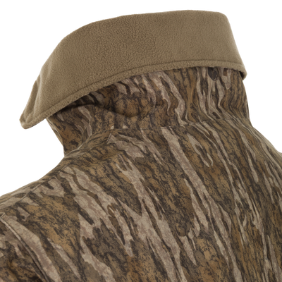Spoonie Waterproof Fleece Lined Quarter Zip Jacket featuring a brown fleece-lined collar and a brown-and-tan camouflage pattern.