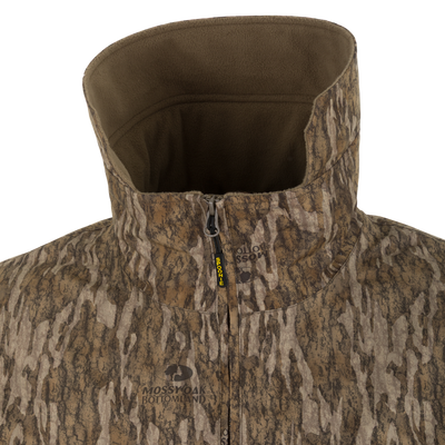 Spoonie Waterproof Fleece Lined Quarter Zip Jacket in a brown camouflage pattern with a waterproof, fleece-lined collar.