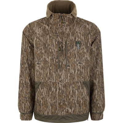 Spoonie Waterproof Fleece Lined Quarter Zip Jacket in a Mossy Oak Bottomland tree-bark camouflage pattern with a quarter-zip, fleece lining, and a small duck logo on the chest.