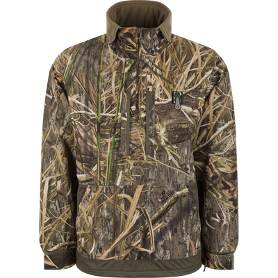 Spoonie Waterproof Fleece Lined Quarter Zip in Mossy Oak Shadow Grass Habitat camouflage, featuring a high collar, vertical zippered chest pocket, and a large front pouch pocket.